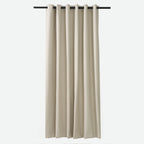 Dakota Textured 100% Block Out Eyelet Curtain in almond, hung from a rod showing the full-length drape