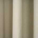 Close-up of the textured woven fabric on the Dakota block out curtain in almond