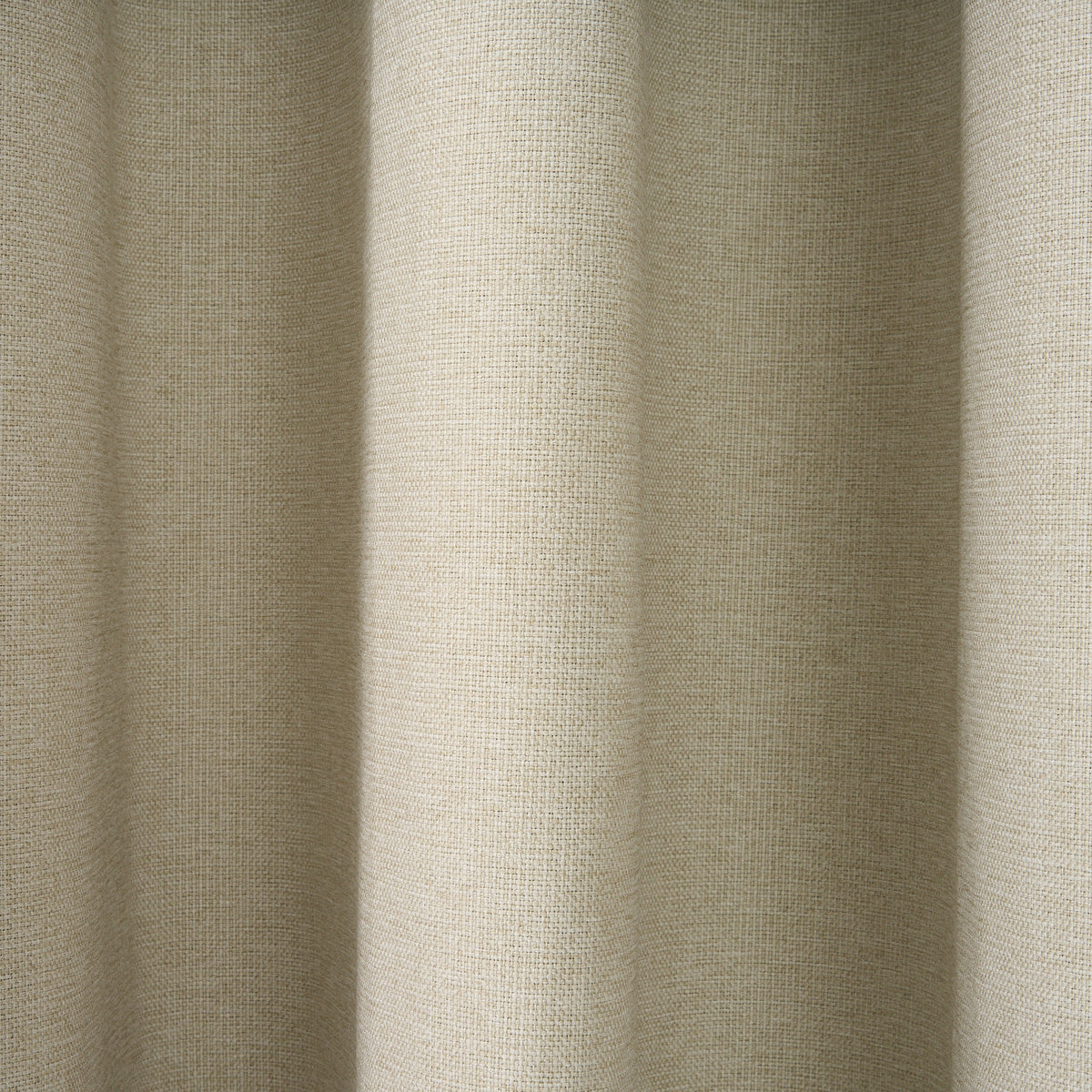 Close-up of the textured woven fabric on the Dakota block out curtain in almond