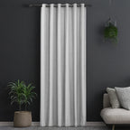 Creme grey Sinclair block out curtain styled in a room with a dark accent wall, potted plants and a sofa with cushions
