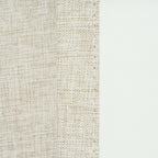 Close-up of the double-woven fabric texture and seam edge on the Sinclair curtain in light stone