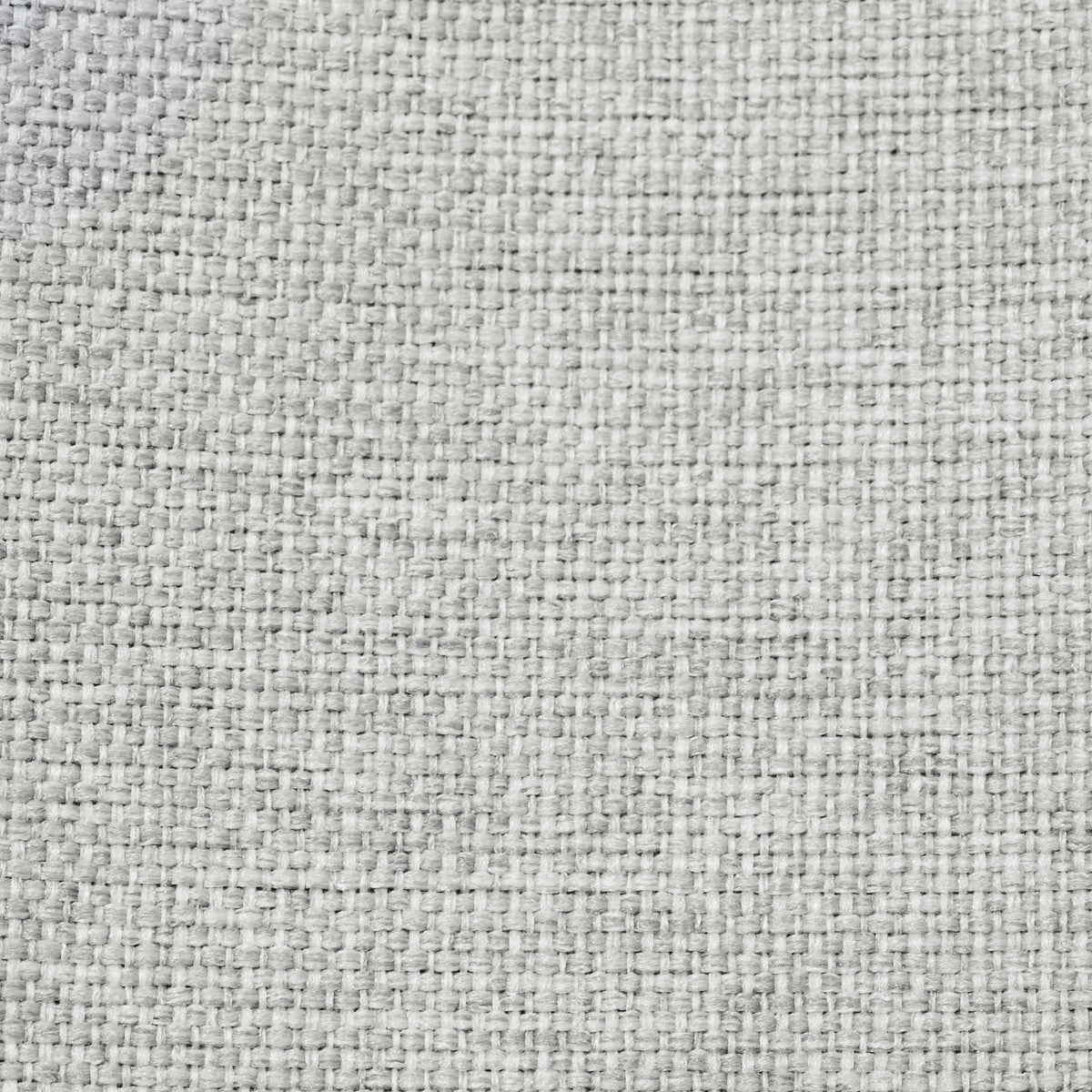 Close-up of the textured woven fabric weave on the Dakota block out curtain in pearl grey