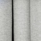Close-up of the textured woven fabric on the Dakota block out curtain in pearl grey