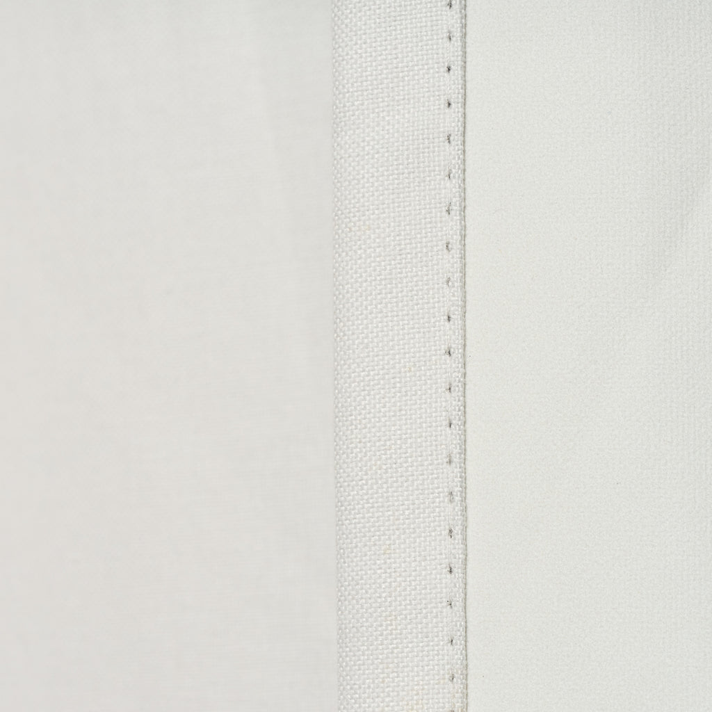 Close-up of the seam edge stitching on the Sinclair block out curtain in white